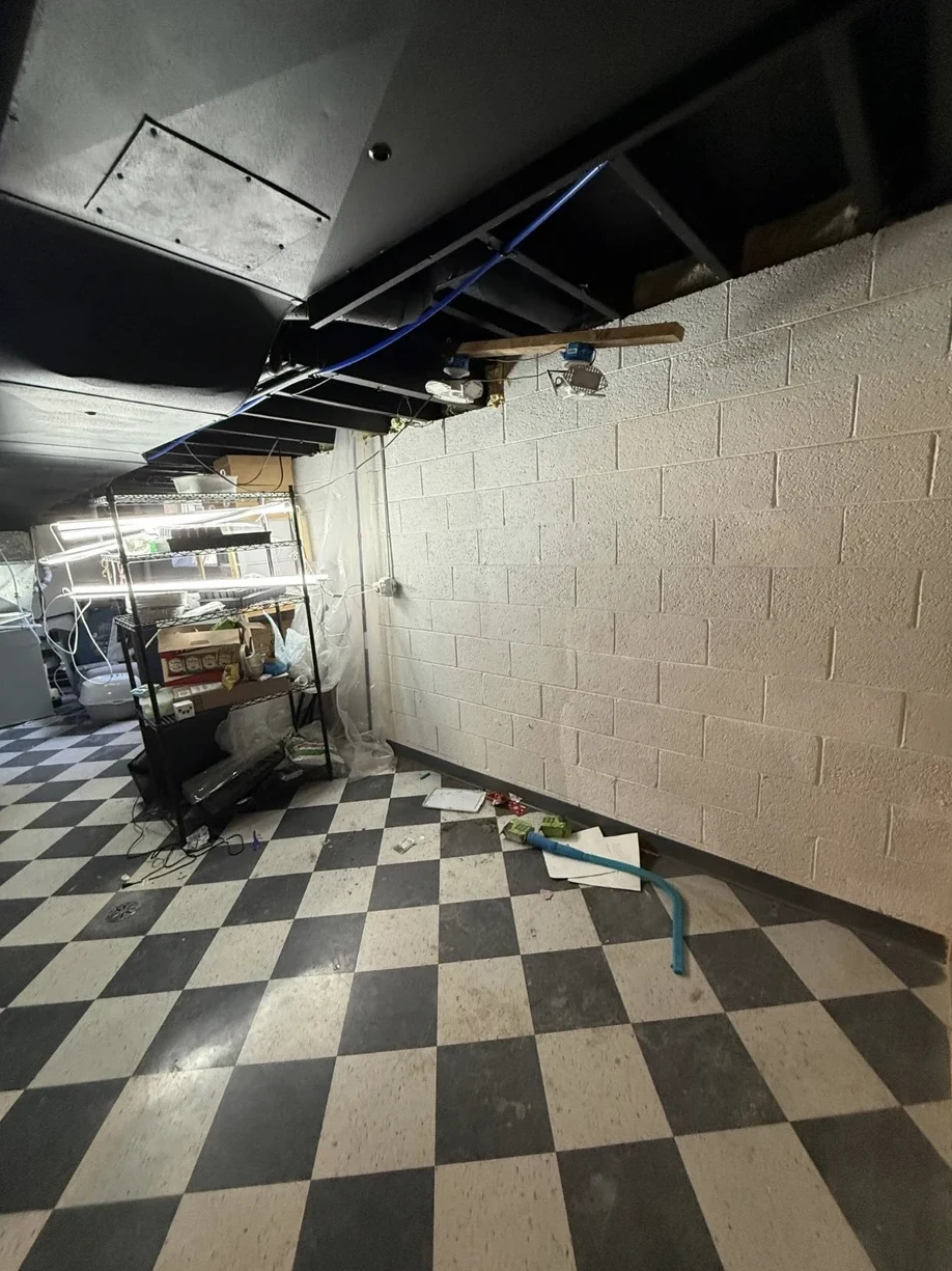 Before — block walls & old tile
